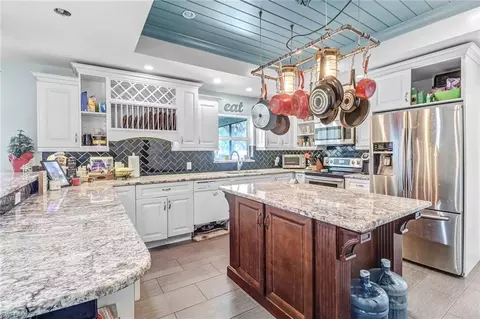 Kitchen - 6171 Cedar Tree Ln, Naples, FL 34116 photo 2 of 3