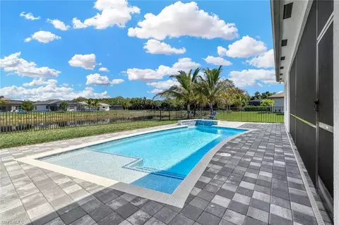 Exterior - 11679 Periwinkle Dr, Naples, FL 34120 photo 7 of 12