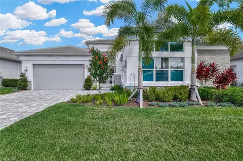 Exterior - 11679 Periwinkle Dr, Naples, FL 34120 photo 2 of 12