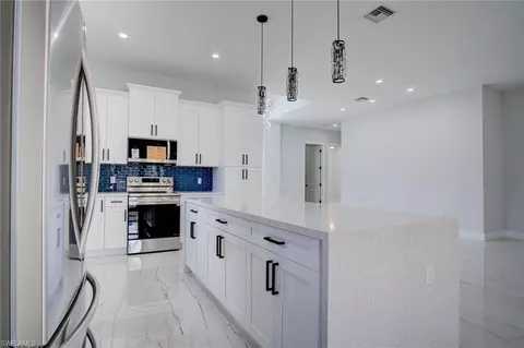 Kitchen - 3280 20th Ave SE, Naples, FL 34117 photo 3 of 6