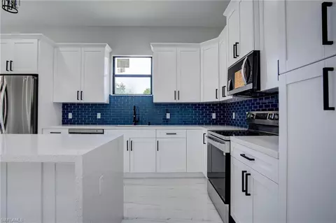 Kitchen - 3280 20th Ave SE, Naples, FL 34117 photo 5 of 6