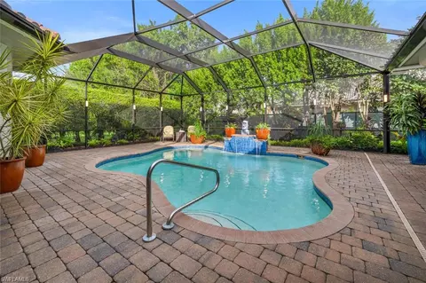 Exterior - 4956 Rustic Oaks Cir, Naples, FL 34105 photo 5 of 10