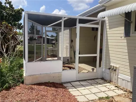 Exterior - 12 Cannes Dr, Naples, FL 34112 photo 7 of 8