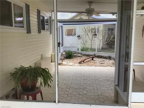 Exterior - 12 Cannes Dr, Naples, FL 34112 photo 5 of 8