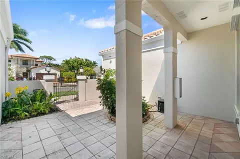 Exterior - 4868 W Boulevard Ct, Naples, FL 34103 photo 7 of 8