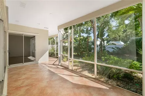 Living - 4868 W Boulevard Ct, Naples, FL 34103 photo 9 of 9