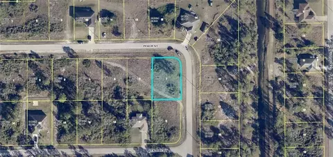 1060 Peach St, Lehigh Acres, FL 33974
