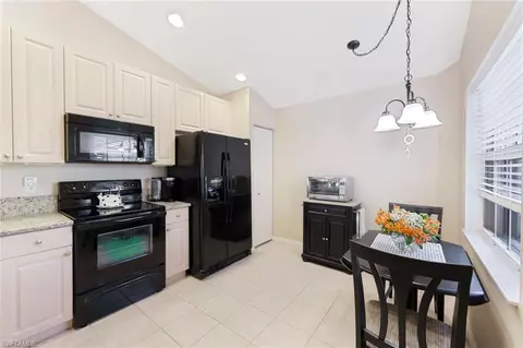 Kitchen - 8917 Cascades Isle Blvd, Estero, FL 33928 photo 1 of 3