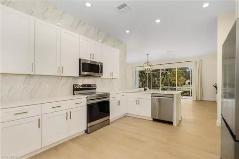Kitchen - 9586 Lismore Ln, Estero, FL 33928 photo 2 of 5