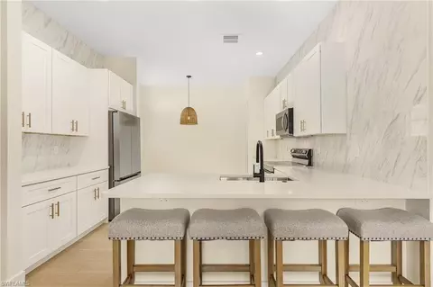 Kitchen - 9586 Lismore Ln, Estero, FL 33928 photo 4 of 5