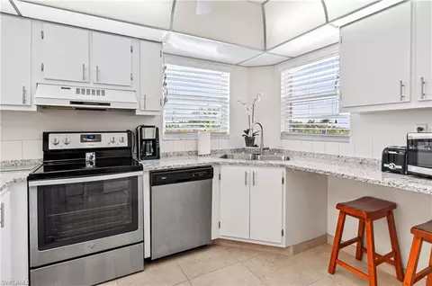 Kitchen - 21 High Point Cir E #410, Naples, FL 34103 photo 1 of 2