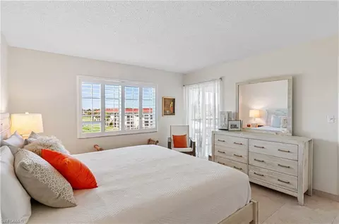 Bedroom - 21 High Point Cir E #410, Naples, FL 34103 photo 2 of 3