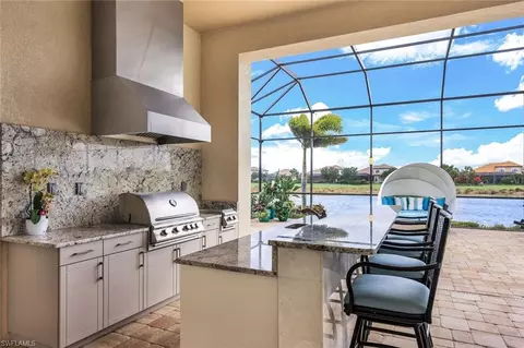 Exterior - 9237 Esplanade Blvd, Naples, FL 34119 photo 4 of 12