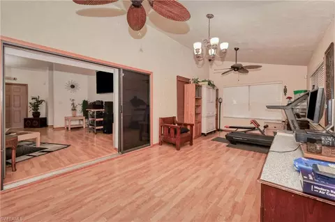 Living - 119 Robert Ave, Lehigh Acres, FL 33936 photo 4 of 7