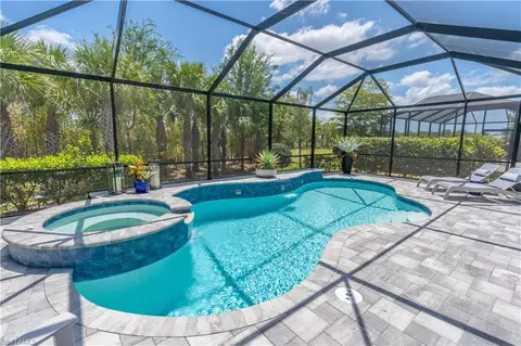 7493 Winding Cypress Dr, Naples, FL 34114