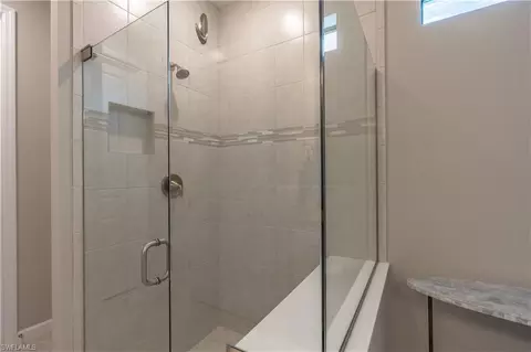 Bath - 7493 Winding Cypress Dr, Naples, FL 34114 photo 2 of 4