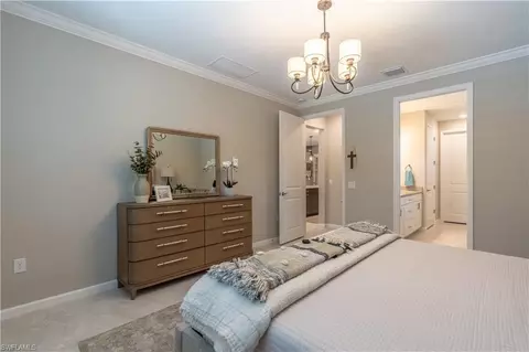 Bedroom - 7493 Winding Cypress Dr, Naples, FL 34114 photo 2 of 5