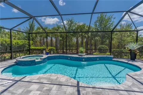 Exterior - 7493 Winding Cypress Dr, Naples, FL 34114 photo 2 of 9