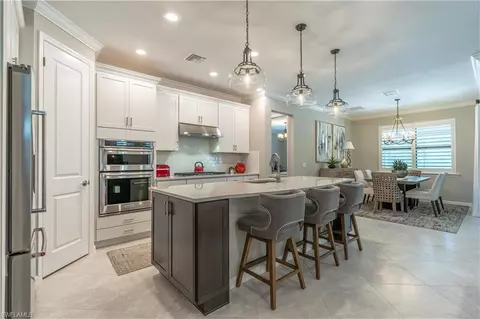 Kitchen - 7493 Winding Cypress Dr, Naples, FL 34114 photo 4 of 5