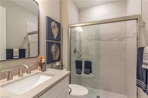 Bath - 7493 Winding Cypress Dr, Naples, FL 34114 photo 3 of 4