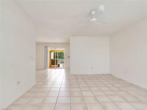 Living - 3476 Balboa Cir E, Naples, FL 34105 photo 2 of 3