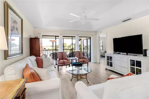 Living - 4310 Chantelle Dr #E201, Naples, FL 34112 photo 2 of 3