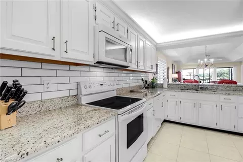 Kitchen - 4310 Chantelle Dr #E201, Naples, FL 34112 photo 2 of 3