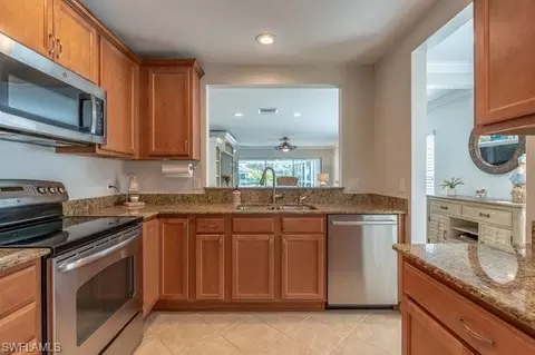 Kitchen - 8693 Querce Ct, Naples, FL 34114 photo 2 of 3