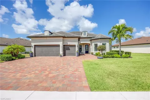 6909 Winding Cypress Dr, Naples, FL 34114 photo 2