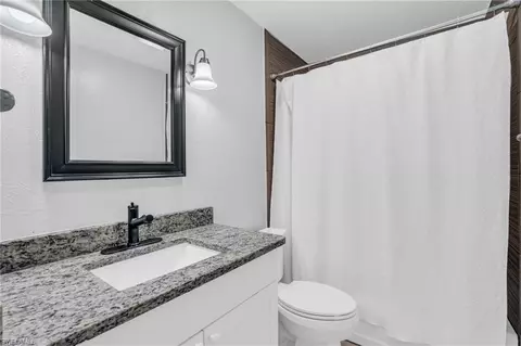 Bath - 883 Coconut Cir E, Naples, FL 34104 photo 2 of 2