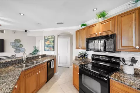 Kitchen - 20241 Burnside Pl #501, Estero, FL 33928 photo 4 of 6