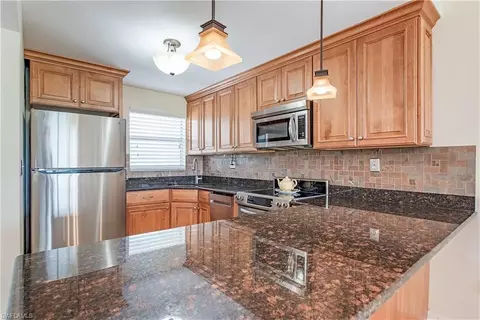 Kitchen - 21 High Point Cir E #309, Naples, FL 34103 photo 1 of 2