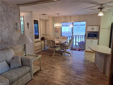 Living - 90 Jan Dr #90, Naples, FL 34104 photo 1 of 2