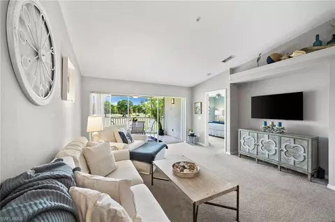 Living - 9087 Michael Cir UNIT 2, Naples, FL 34113 photo 3 of 4