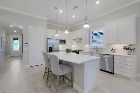 9398 Greyhawk Trl, Naples, FL 34120