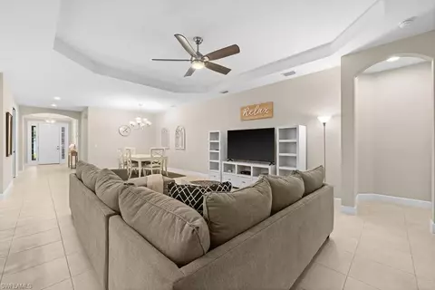 Living - 8664 Dilillo Ct, Naples, FL 34119 photo 2 of 2
