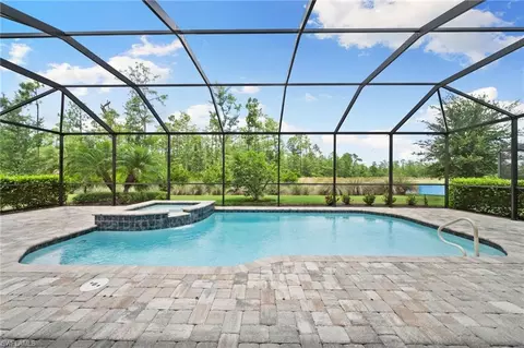 7628 Winding Cypress Dr, Naples, FL 34114