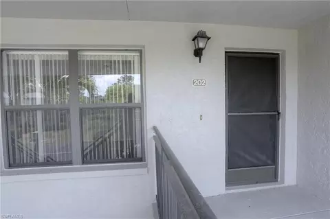 Exterior - 1219 Commonwealth Cir #E202, Naples, FL 34116 photo 1 of 9
