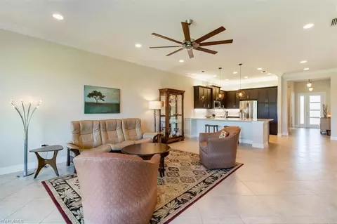 Living - 13663 Mandarin Cir, Naples, FL 34109 photo 2 of 2