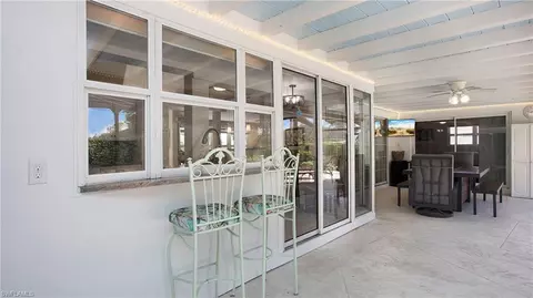 Exterior - 560 Cypress Way E, Naples, FL 34110 photo 3 of 10