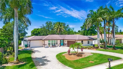 Exterior - 560 Cypress Way E, Naples, FL 34110 photo 9 of 10