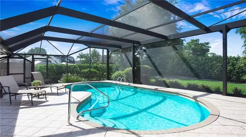 Exterior - 560 Cypress Way E, Naples, FL 34110 photo 2 of 10