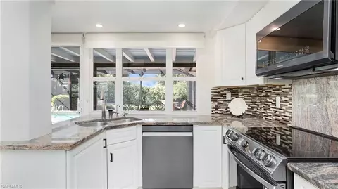 Kitchen - 560 Cypress Way E, Naples, FL 34110 photo 5 of 6