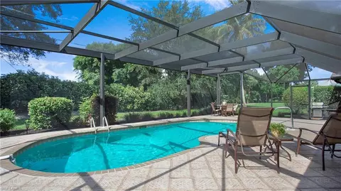 Exterior - 560 Cypress Way E, Naples, FL 34110 photo 4 of 10