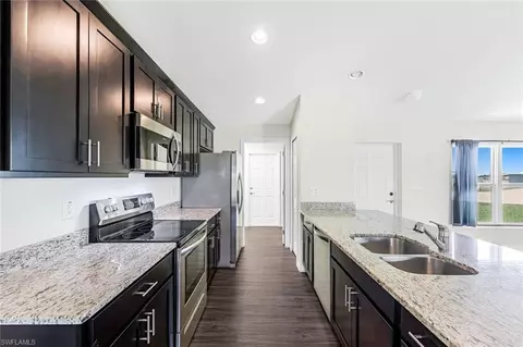 Kitchen - 7002 Ramrod Ct, Labelle, FL 33935 photo 1 of 2