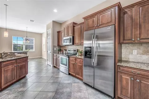 Kitchen - 8237 Valiant Dr, Naples, FL 34104 photo 2 of 3