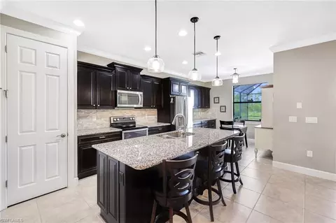 Kitchen - 13590 San Georgio Dr, Estero, FL 33928 photo 2 of 6