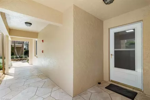 1025 Foxfire Ln #101, Naples, FL 34104 photo 4