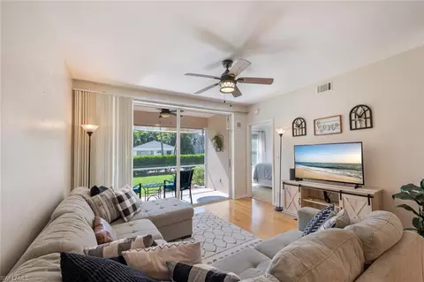 Living - 328 Bradstrom Cir #E102, Naples, FL 34113 photo 2 of 3