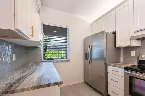 Kitchen - 328 Bradstrom Cir #E102, Naples, FL 34113 photo 3 of 5